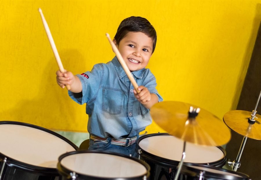 A child playing the drums